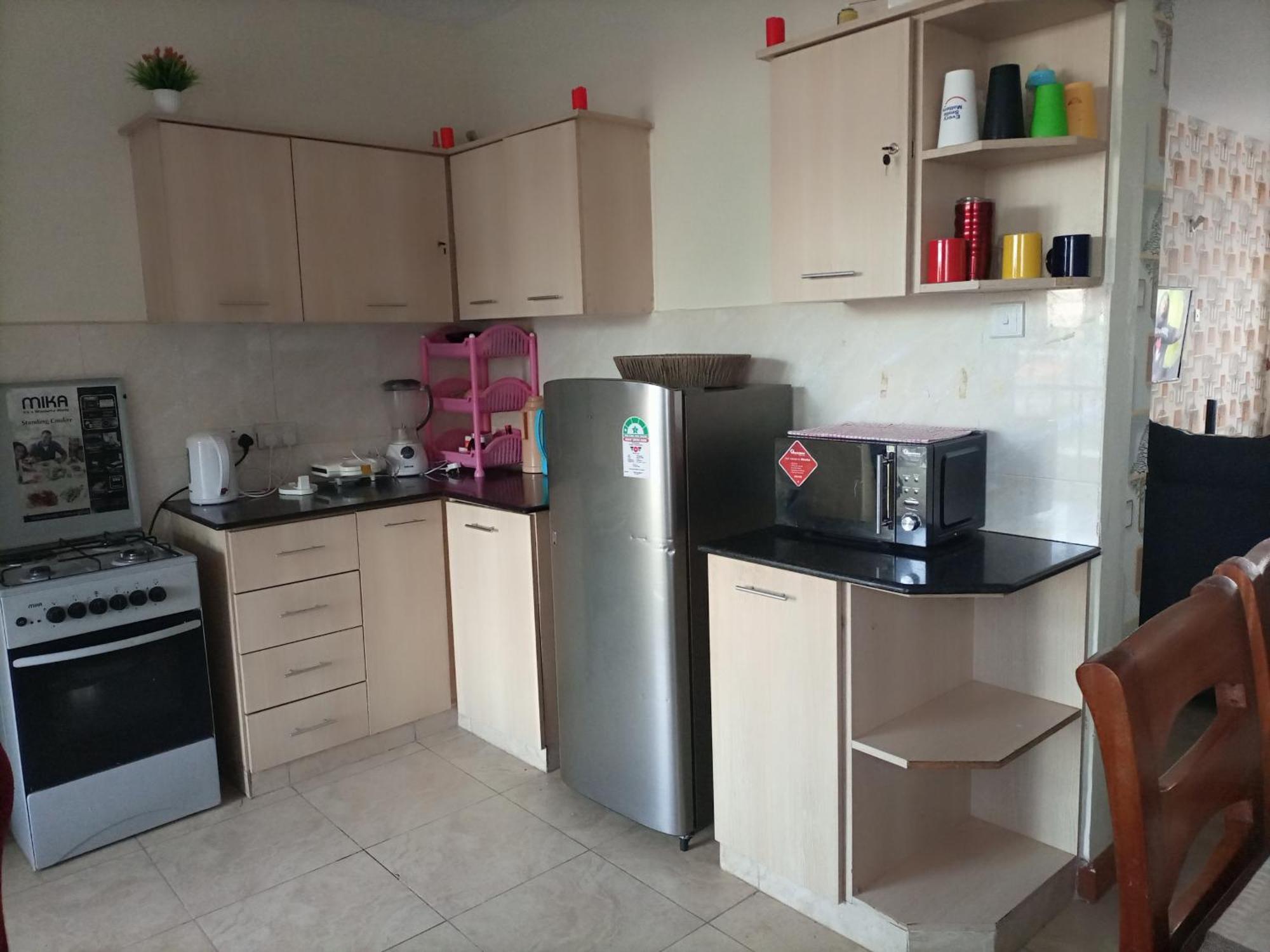 Jkia Homestays Найроби Номер фото