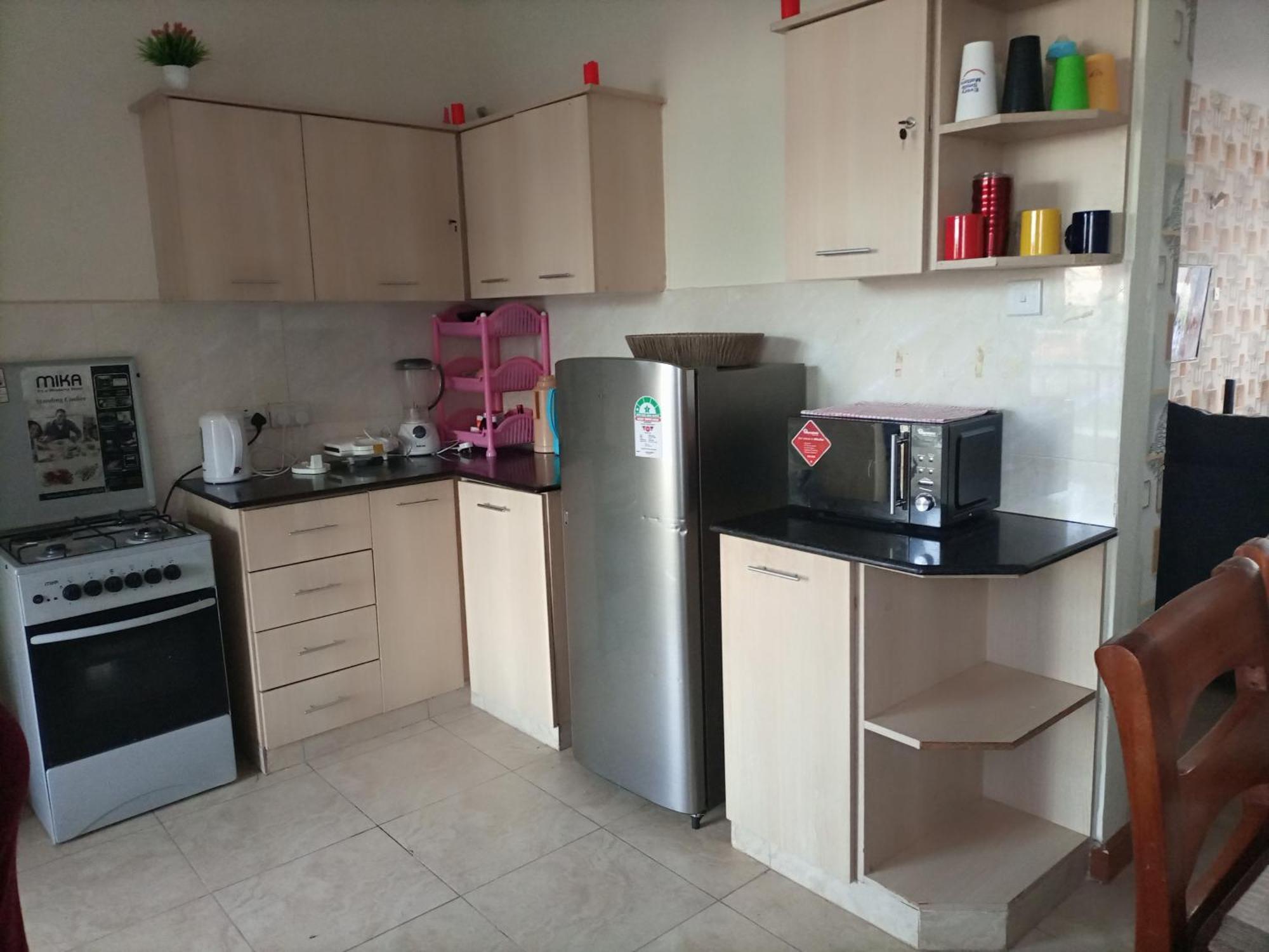 Jkia Homestays Найроби Номер фото